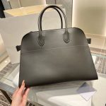 The Row Margaux 15 large capacity shopper handbag in box leather with protective feet