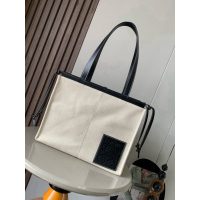 Loewe canvas cushion shopper handbag weekend getaway keepall luggage resort beach tote