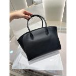 The Row Marlo 12 Tote Bag in polish saddle leather full boutique package