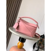 dual size Loewe puzzle edge top-handle tote handbag in rich pink with protective bar