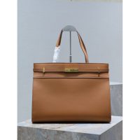YSL Manhattan structured shoulder tote in smooth box leather with protective studs