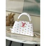 Louis Vuitton capucine bb top handle bag spacious shopper handbag with protective feet