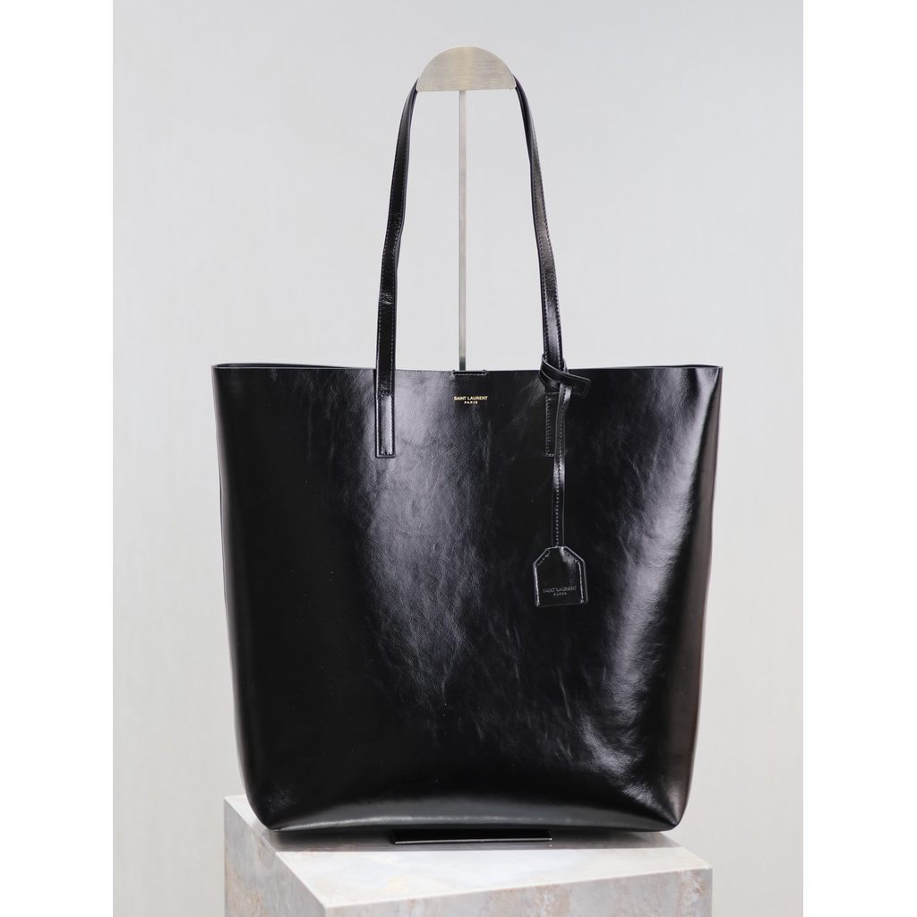 ph-11134201-820lh-mpa8xqa2yej2f5.jpg YSL minimalist open-top shoulder shopping tote chic resort beach tote in shiny calfskin - 图片 1
