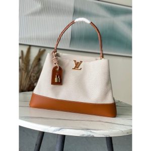 Louis Vuitton LV Capucines MM Handbag in Canvas and Calfskin