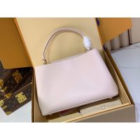 Louis Vuitton LV Capucines MM Top Handle handbag in orange calfskin