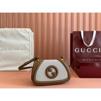Gucci small Saddle Bag in GG Canvas and Calfskin
