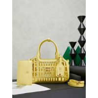 Small Women's laser-cut cage shopping handabg Miu miu resort beach tote with detachable clutch