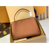 Louis Vuitton LV Capucines MM Top Handle handbag in orange calfskin