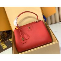 Louis Vuitton LV Capucines MM Top Handle handbag in scarlet red calfskin