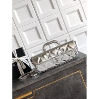 Chanel East-West Top Handle Baguette/mini handbag in metallic patent leather