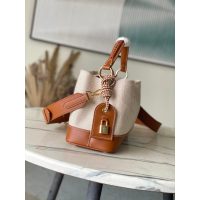 Louis Vuitton LV Capucines MM Handbag in Canvas and Calfskin