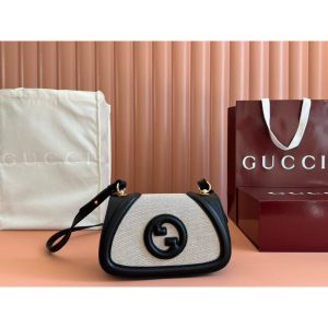 Gucci small Saddle Bag in GG Canvas and Calfskin