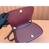 Gucci small Saddle Bag in GG Canvas and Calfskin