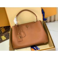 Louis Vuitton LV Capucines MM Top Handle handbag in orange calfskin
